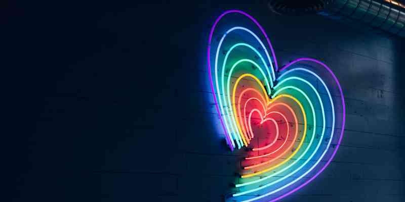 Rainbow colored heart made out of lights